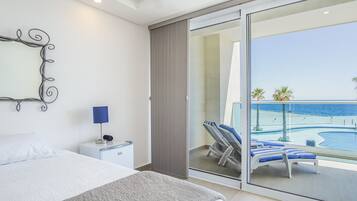 Condo, Multiple Beds, Balcony, Ocean View (Encantame Towers Verano 205) | 2 bedrooms, individually decorated, individually furnished, bed sheets