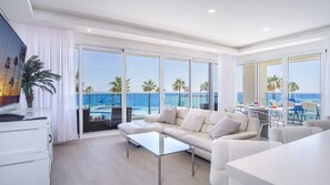 Condo, Multiple Beds, Balcony, Ocean View (Encantame Towers Verano 205) | Living area | 42-inch flat-screen TV with digital channels