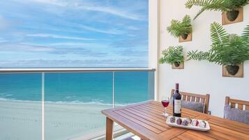 Condo, Multiple Beds, Balcony, Ocean View (Encantame Towers Verano 1102) | Outdoor dining