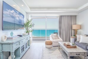 Appartement, Meerdere bedden, balkon, uitzicht op zee (Encantame Towers Verano 1102) | Woonruimte | Een 42-inch flatscreentelevisie met digitale zenders