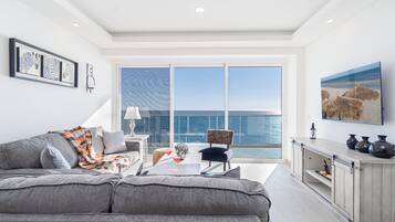 Condo, Multiple Beds, Balcony, Ocean View (Encantame Towers Velero 902) | Living area | 42-inch flat-screen TV with digital channels