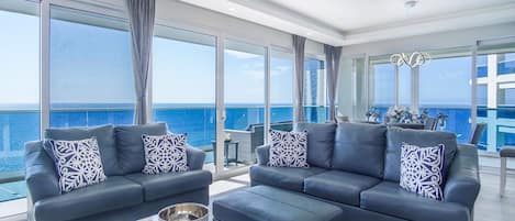 Condo, Multiple Beds, Balcony, Ocean View (Encantame Towers Verano 2105) | Living area | 42-inch flat-screen TV with digital channels