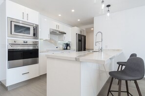 Condo, Multiple Beds, Balcony, Ocean View (Encantame Towers Velero 1604) | Private kitchen | Dining tables - Sandy Paws 2 Bedroom 2 Bath Ocean Front Encantame Towers C1604 (Puerto Peñasco)