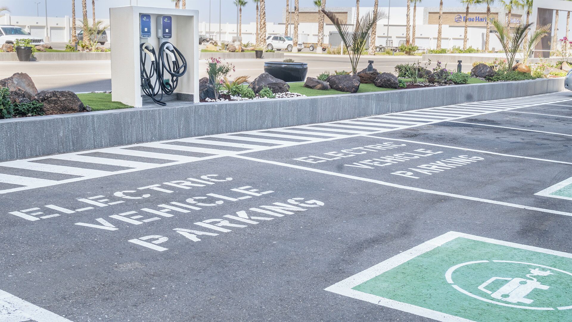 A parking area marked for electric vehicles with charging stations.