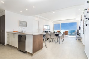 Condo, Multiple Beds, Balcony, Ocean View (Encantame Towers Velero 1102) | Private kitchen | Dining tables - Amazing 2 Bedroom Beach Front Condominium at Encantame C1102 (Puerto Peñasco)