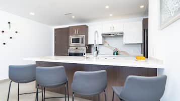 Condo, Multiple Beds, Balcony, Ocean View (Encantame Towers Velero 1102) | Private kitchen | Dining tables