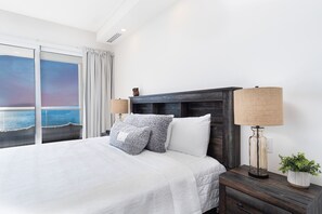 Condo, Multiple Beds, Balcony, Ocean View (Encantame Towers Velero 1102) | 2 bedrooms, individually decorated, individually furnished, bed sheets