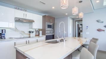 Condo, Multiple Beds, Balcony, Ocean View (Encantame Towers Verano 2205) | Private kitchen | Dining tables