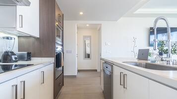 Condo, Multiple Beds, Balcony, Ocean View (Encantame Towers Verano 105) | Private kitchen | Dining tables