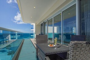 Condo, Multiple Beds, Balcony, Ocean View (Encantame Towers Verano 505) | Outdoor dining
