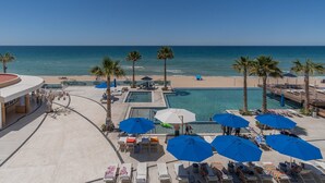 A resort with a pool, beach, and ocean view. - Unique Condo by the Beach at Encantame Towers C305 (Puerto Peñasco)