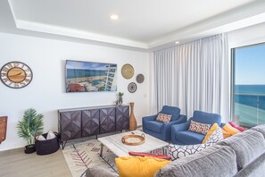 Condo, Multiple Beds, Balcony, Ocean View (Encantame Towers Verano 805) | Living area | 42-inch flat-screen TV with digital channels