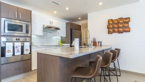 Condo, Multiple Beds, Balcony, Ocean View (Encantame Towers Viento 404) | Private kitchen | Dining tables - A Sanctuary Of Tranquillity Encantame Viento 404 (Puerto Peñasco)