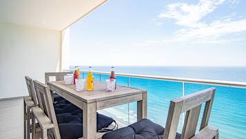 Condo, Multiple Beds, Balcony, Ocean View (Encantame Towers Velero 2302) | Outdoor dining