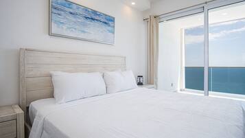 Condo, Multiple Beds, Balcony, Ocean View (Encantame Towers Velero 2302) | 2 bedrooms, individually decorated, individually furnished