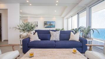 Condo, Multiple Beds, Balcony, Ocean View (Encantame Towers Velero 2302) | Living area | 42-inch flat-screen TV with digital channels