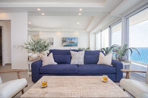 Condo, Multiple Beds, Balcony, Ocean View (Encantame Towers Velero 2302) | Living area | 42-inch flat-screen TV with digital channels