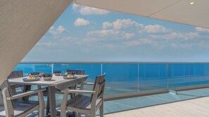 Condo, Multiple Beds, Balcony, Ocean View (Encantame Towers Verano 2103) | Outdoor dining