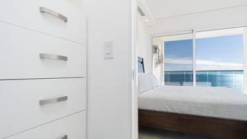 Condo, Multiple Beds, Balcony, Ocean View (Encantame Towers Velero 702) | 2 bedrooms, individually decorated, individually furnished, bed sheets