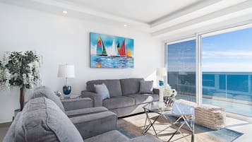 Condo, Multiple Beds, Balcony, Ocean View (Encantame Towers Velero 702) | Living area | 42-inch flat-screen TV with digital channels