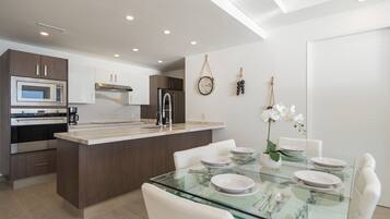 Condo, Multiple Beds, Balcony, Ocean View (Encantame Towers Velero 702) | Private kitchen | Dining tables