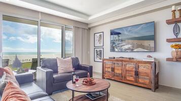 Condo, Multiple Beds, Balcony, Ocean View (Encantame Towers Verano 101) | Living area | 42-inch flat-screen TV with digital channels