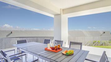 Condo, Multiple Beds, Balcony, Ocean View (Encantame Towers Verano 101) | Outdoor dining