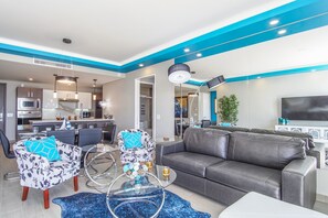 Condo, Multiple Beds, Balcony, Ocean View (Encantame Towers Velero 102) | Living area | 42-inch flat-screen TV with digital channels