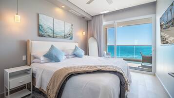 Condo, Multiple Beds, Balcony, Ocean View (Encantame Towers Viento 1102) | 2 bedrooms, individually decorated, individually furnished, bed sheets