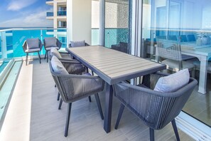 Condo, Multiple Beds, Balcony, Ocean View (Encantame Towers Verano 1405) | Outdoor dining - Luxury Modern Condo at Encantame Towers E1405 (Puerto Peñasco)