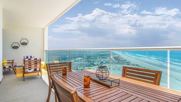 Condo, Multiple Beds, Balcony, Ocean View (Encantame Towers Verano 1402) | Outdoor dining