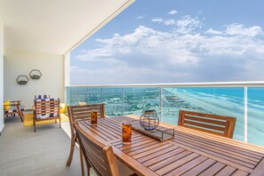 Condo, Multiple Beds, Balcony, Ocean View (Encantame Towers Verano 1402) | Outdoor dining