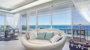 Condo, Multiple Beds, Balcony, Ocean View (Encantame Towers Verano 1101) | Living area | 42-inch flat-screen TV with digital channels