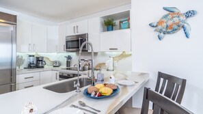 Condo, 1 King Bed with Sofa bed, Balcony, Ocean View (Encantame Towers Velero 1403) | Private kitchen | Dining tables
