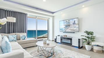 Condo, Multiple Beds, Balcony, Ocean View (Encantame Towers Viento 1202) | Living area | 42-inch flat-screen TV with digital channels