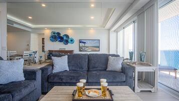 Condo, Multiple Beds, Balcony, Ocean View (Encantame Towers Velero 2202) | Living area | 42-inch flat-screen TV with digital channels