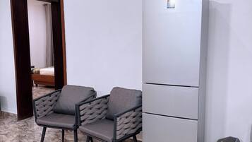 Appartement Deluxe, balcon, vue ville | Coin séjour