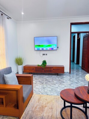 Deluxe appartement, balkon, uitzicht op de stad | Woonruimte