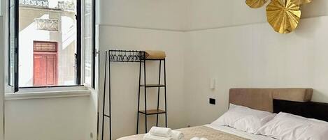 1 غرفة نوم وواي فاي وملاءات أسرّة