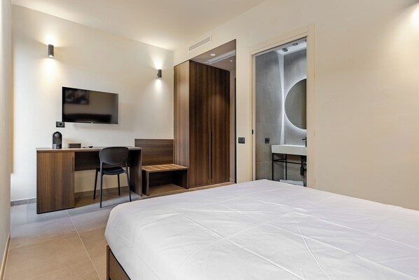 スーペリア ルーム | エジプト綿のシーツ、高級寝具、羽毛の掛け布団、ピロートップベッド