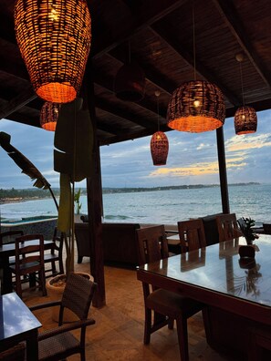 Breakfast, lunch, dinner served; beach views