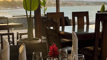 Breakfast, lunch, dinner served; beach views