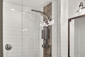 Shower, hair dryer, towels, soap - Fully Renovated Penthouse Loft w/ Central Air Conditioning (Fernie)