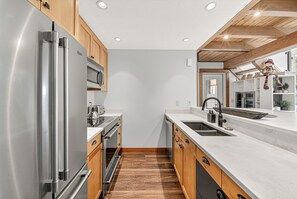 Microwave, oven, stovetop, dishwasher - Fully Renovated Penthouse Loft w/ Central Air Conditioning (Fernie)
