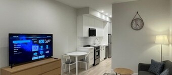 Charming penthouse studio with spectacular ocean and mountain views