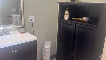 Hair dryer, towels, soap, toilet paper