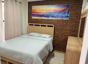 1 habitación, tabla de planchar con plancha, wifi gratis y ropa de cama 