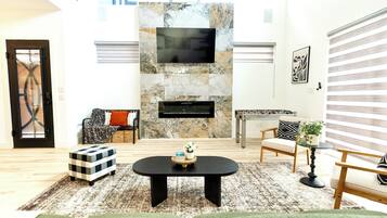 Smart TV, fireplace, table football