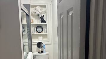 Shower, towels, soap, toilet paper