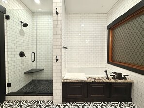 Shower, jetted tub, hair dryer, towels